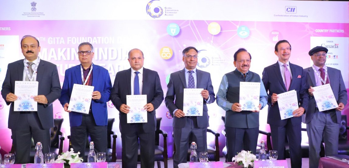 Dignitaries releasing a publication at the 8th Foundation Day function of Global Innovation and Technology Alliance (GITA)
