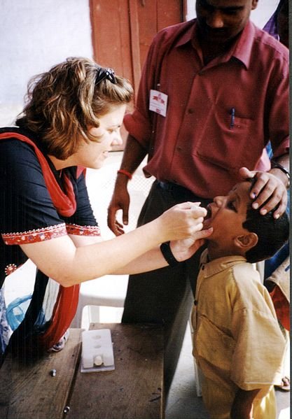 A child being administered polio drops as a part of the immunization drive 