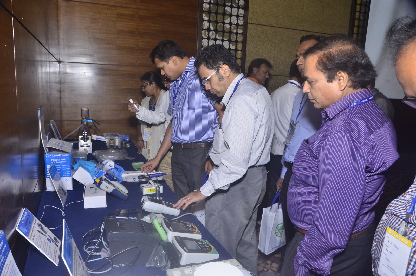 Participants from industry taking a look at various product samples of Cole Parmer showcased at the event.