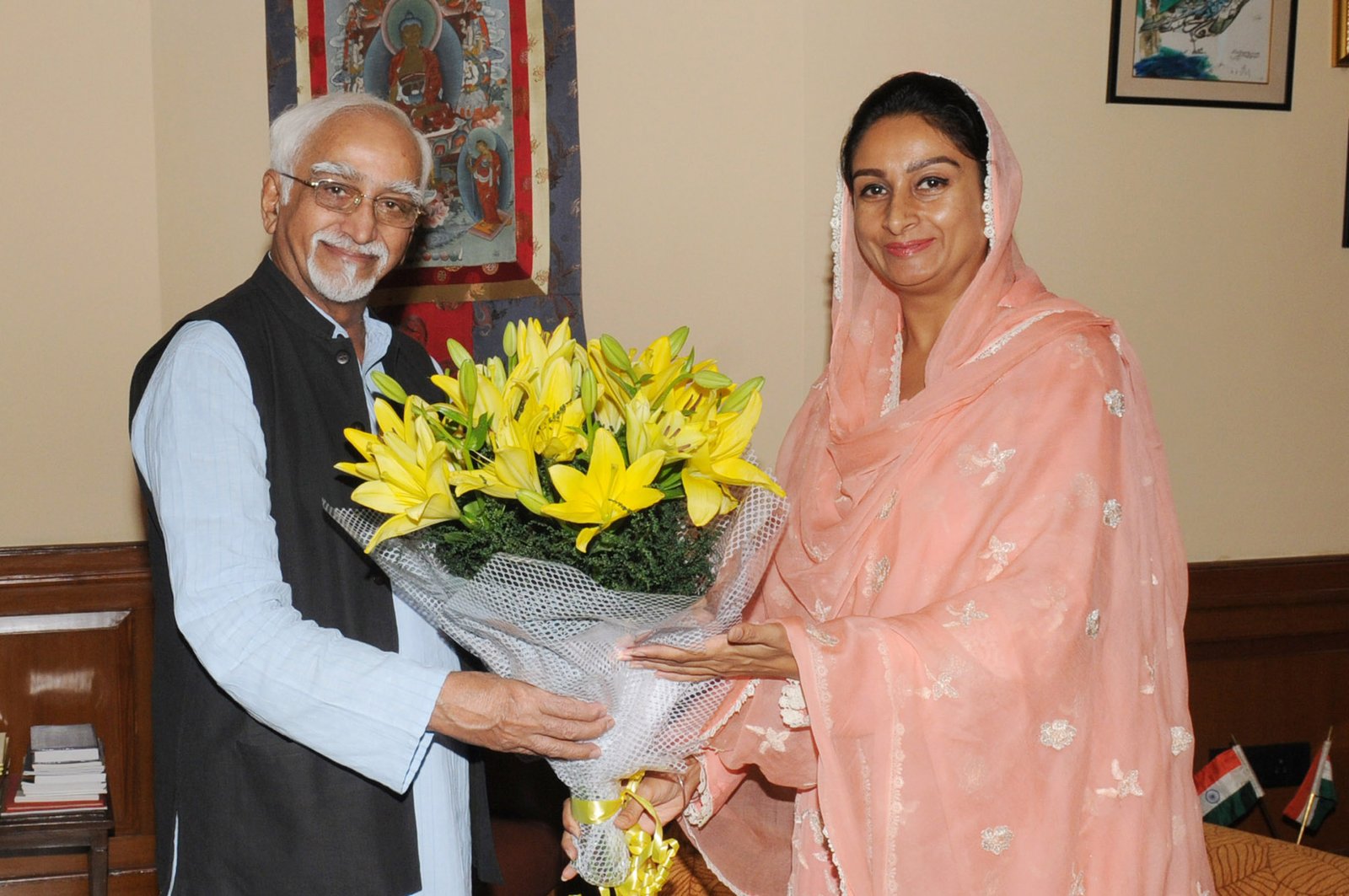 (File Photo) Mrs Harsimrat Kaur Badal, minister for food processing industries with Mr Hamid Ansari, vice president of India (R)