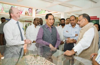 Mr Radha Mohan Singh (R), union minister for agriculture, interacting with Dr William D Dar (L), director general, ICRISAT, and other senior ICRISAT staff at the institute's headquarters in Patancheru, Hyderabad.