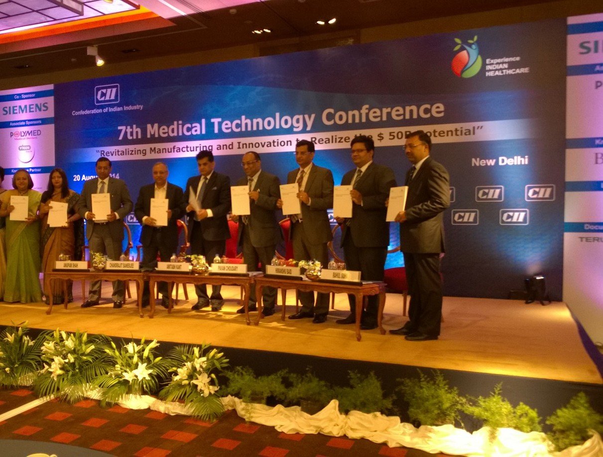 Mr Amitabh Kant, DIPP secretary along with Mr Pavan Choudary, chairman, Medical Technology Division of the CII unveiling the CII-BCG Vision Document - 2025