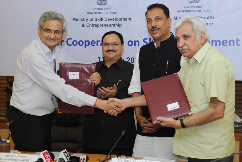 Union health minister, Mr JP Nadda (2nd from L) and the minister of state for skill development and entrepreneurship, Mr Rajiv Pratap witnessing the signing ceremony for cooperation on skill development, in New Delhi on July 11, 2015