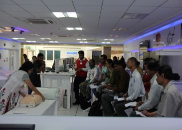 Dr Mabel Vasnaik demonstrating the use of AED to the audience