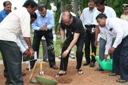 The minister of state for agriculture and food processing, Tariq Anwar planting a tree at NIANP, Bangalore