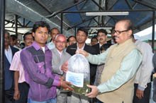 Lending a helping hand : MOS for agriculture, Tariq Anwar gives away fish seeds to poor farmers